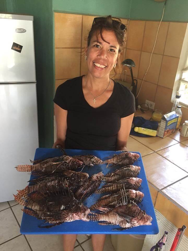 Abigail Vrolijk preparing lionfish
