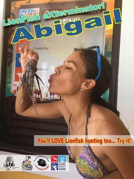 Abigail Vrolijk with a lionfish