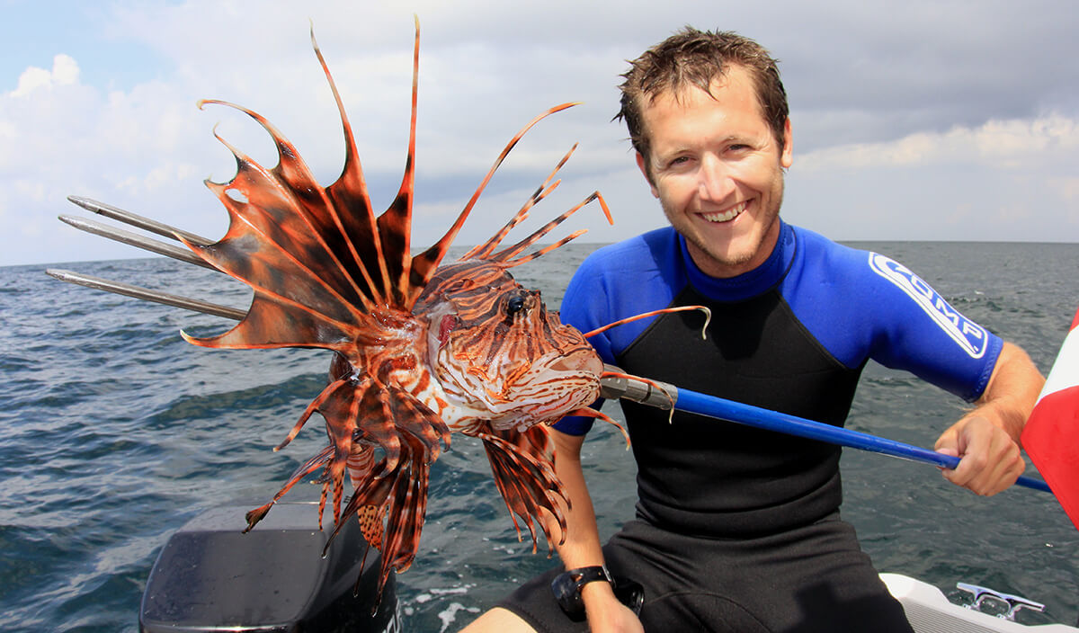 Alex Fogg and speared lionfish