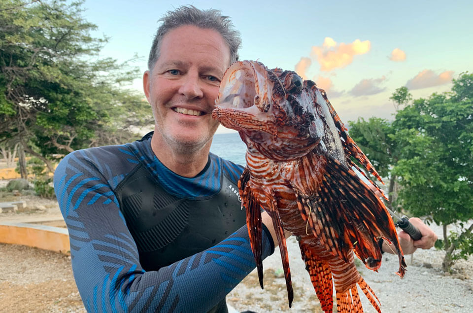 Roland Verbeek holding lionfish