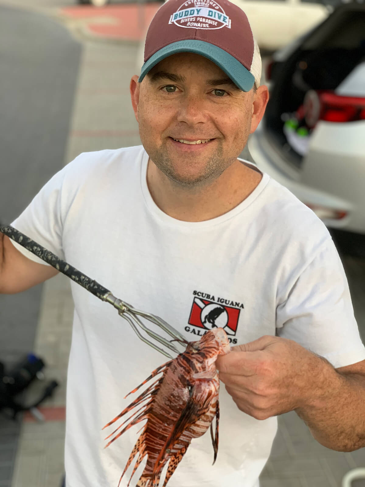 Jared Casperson holding speared lionfish