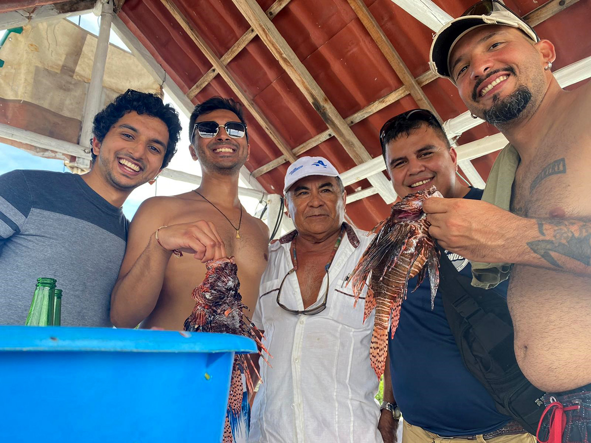 James Alicea and lionfish hunting friends
