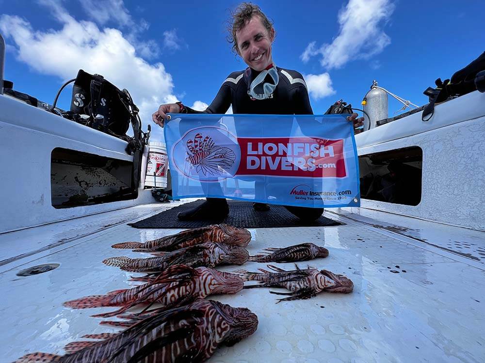 Lukas Moorhead with lionfish catch of the day