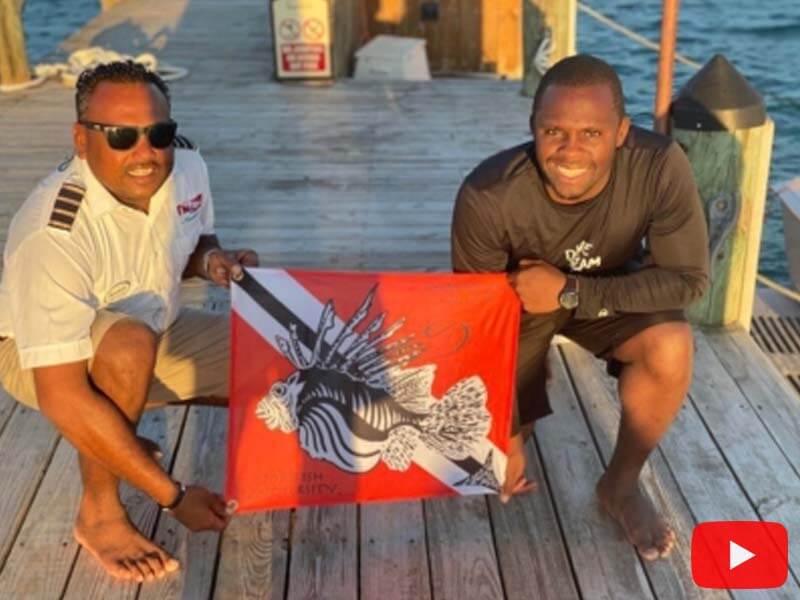 Jamaica lionfish hunting holding LFU flag