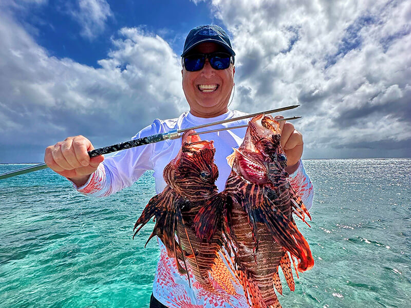Roger with 2 lionfish on his spear