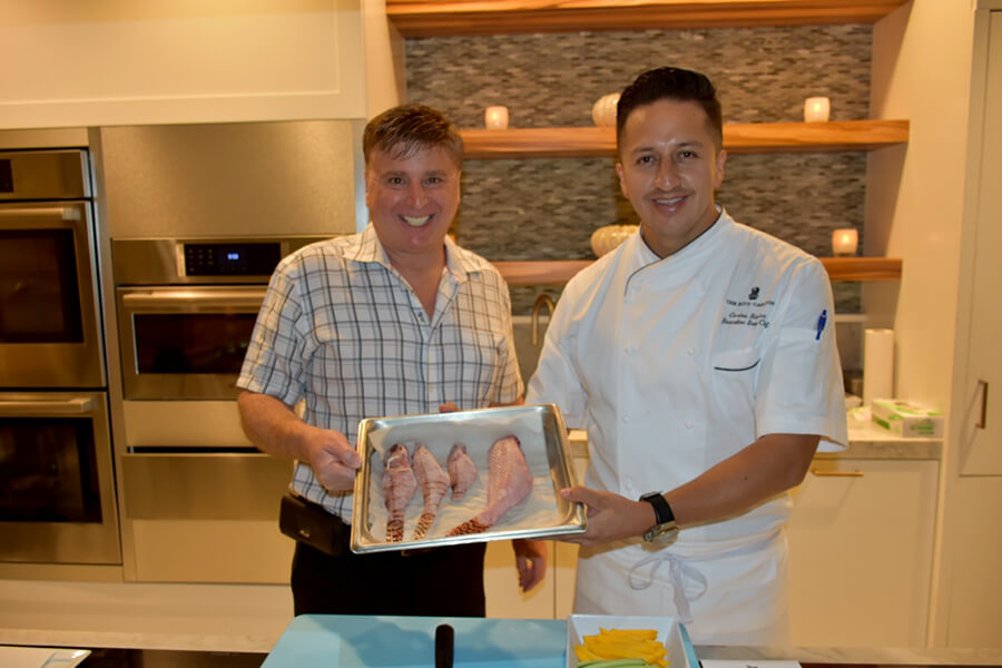 Roger J. Muller Jr. with chef at the Ritz-Carlton Grand Cayman