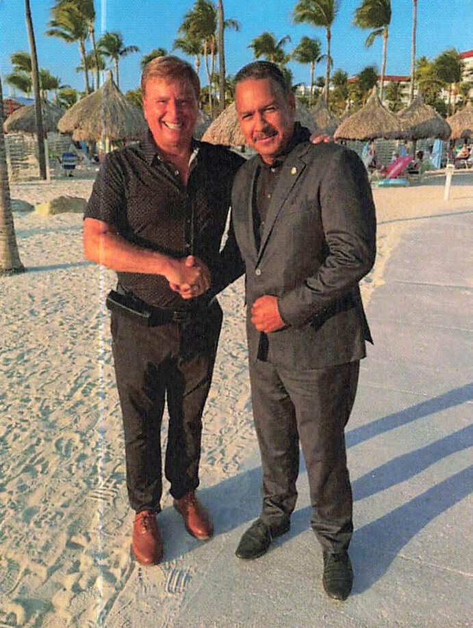 Roger J. Muller Jr. with Parliament Member Carlos Anthony Bermudez