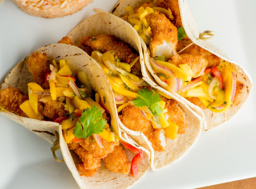 Three friend lionfish tacos on a plate